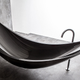 Illustration for article titled This Insane Carbon Fiber Hammock Bathtub Is the Epitome Of Relaxation